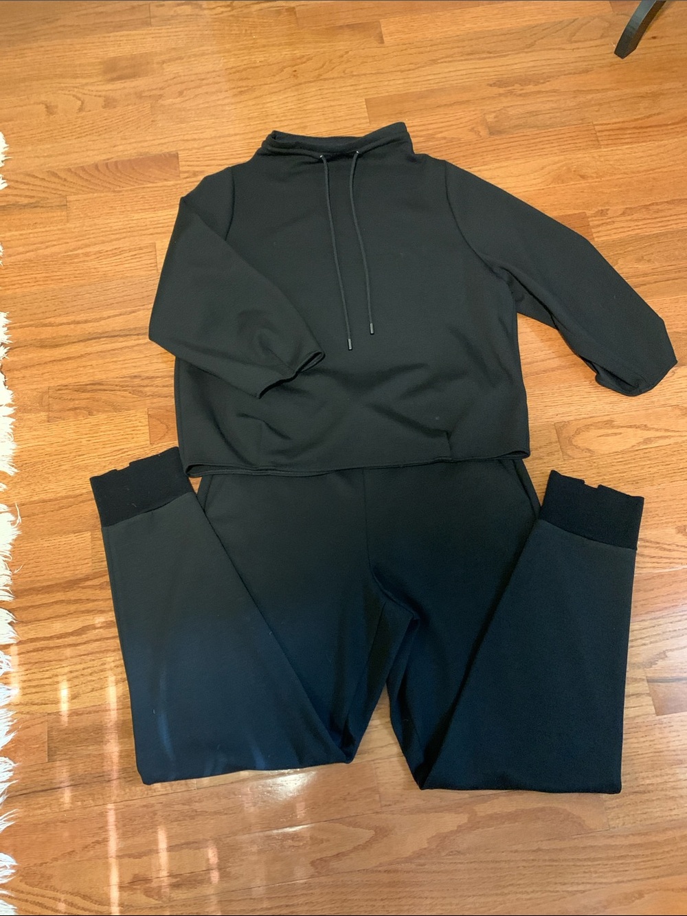 Theory set black. Top is size small. Bottoms size medium